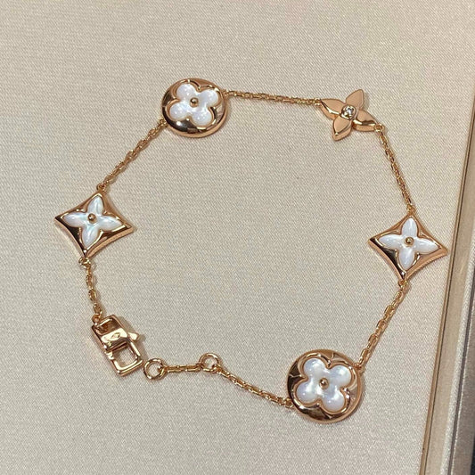 [Love's Uplift]STAR AND SUN 5 MOTIF MOP PINK GOLD BRACELET