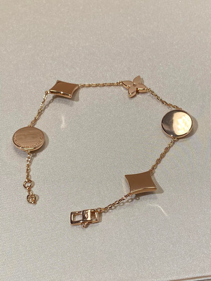[Love's Uplift]STAR AND SUN 5 MOTIF MOP PINK GOLD BRACELET