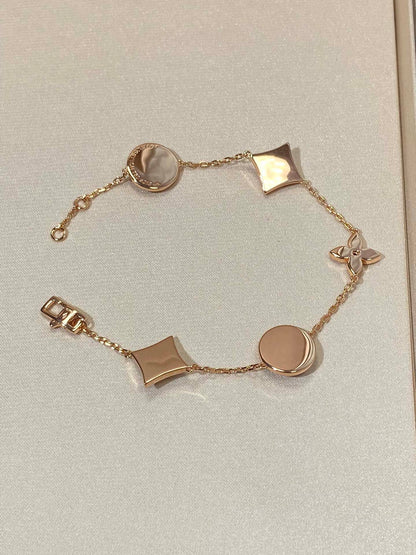 [Love's Uplift]STAR AND SUN 5 MOTIF MOP PINK GOLD BRACELET