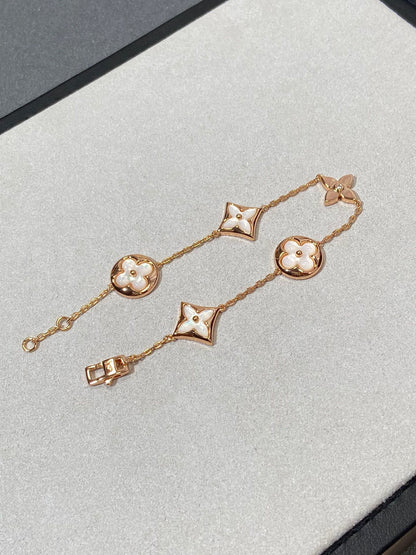 [Love's Uplift]STAR AND SUN 5 MOTIF MOP PINK GOLD BRACELET