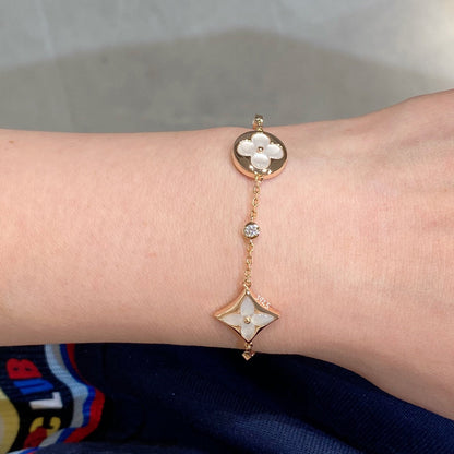 [Love's Uplift]STAR AND SUN 4 MOTIF WHITE MOP PINK GOLD BRACELET