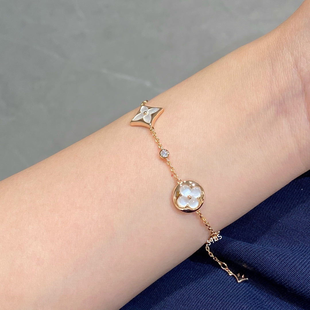[Love's Uplift]STAR AND SUN 4 MOTIF WHITE MOP PINK GOLD BRACELET