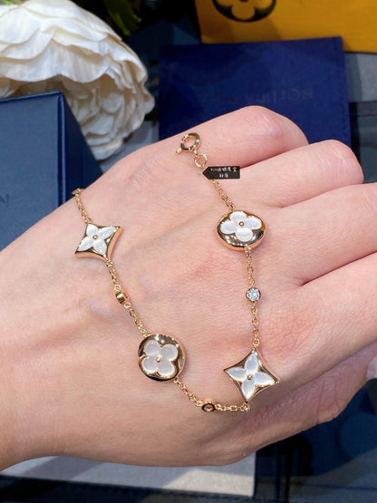 [Love's Uplift]STAR AND SUN 4 MOTIF WHITE MOP PINK GOLD BRACELET
