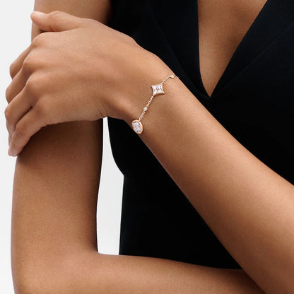 [Love's Uplift]STAR AND SUN 4 MOTIF WHITE MOP PINK GOLD BRACELET