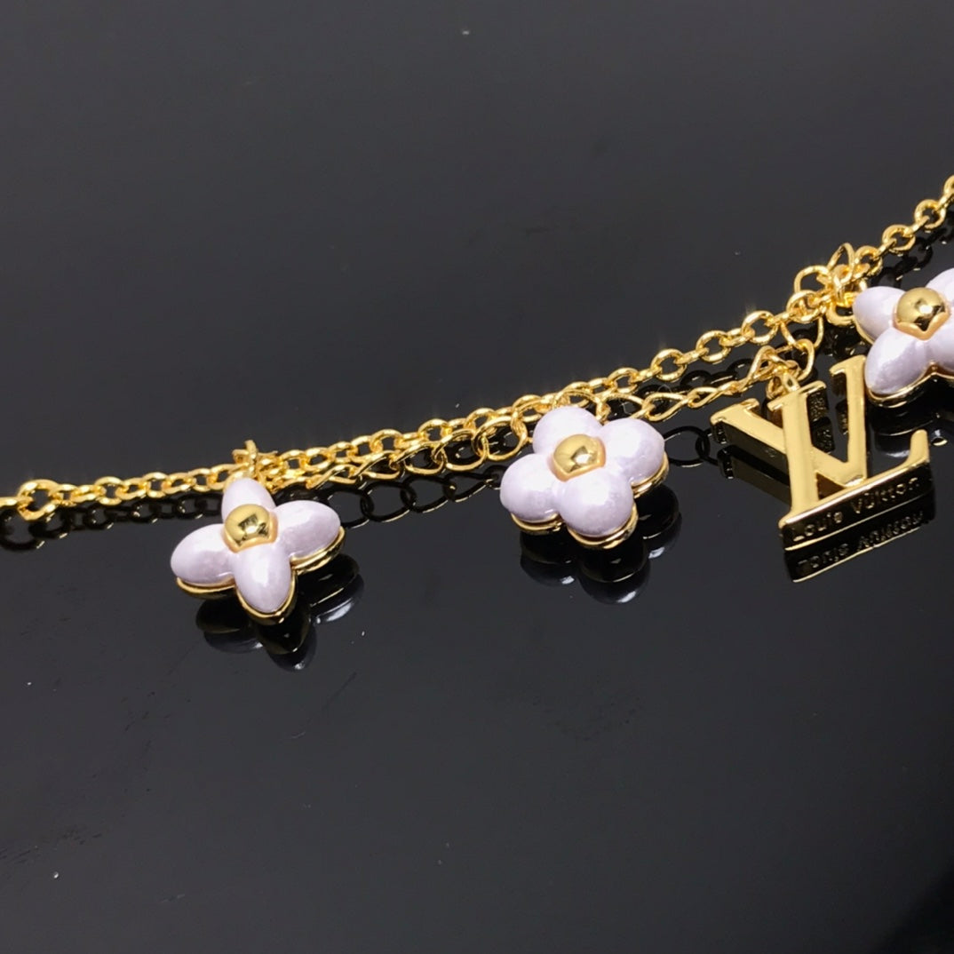 [Love's Uplift]LOGO 6 MOTIF STAR AND SUN GOLD BRACELET